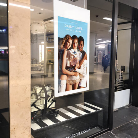 Indoor double-sided window display digital screens with high brightness screen facing outwards and standard brightness facing inwards
