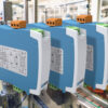 Spectra indThree DIN rail-mounted I3D signal duplicators installed in an industrial control panel, used for isolating and duplicating process signals. ustrial controls convertor for process signals
