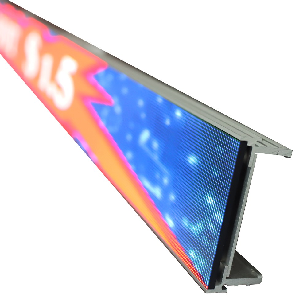 MiniCOB LED Display – Super Slim Shelf-Edge Screen Close-up angled view of the MiniCOB LED shelf-edge display, showing dense LED pixel structure rendering a bright graphic pattern.