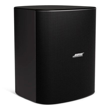 Matte black Bose Professional DesignMax DM12SE high-output surface-mount speaker with matching dark powder-coated aluminum grille for architectural audio installations.